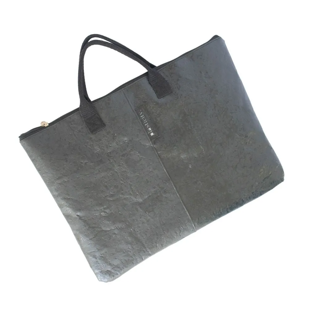 Water-resistant upcycled plastic laptop cover